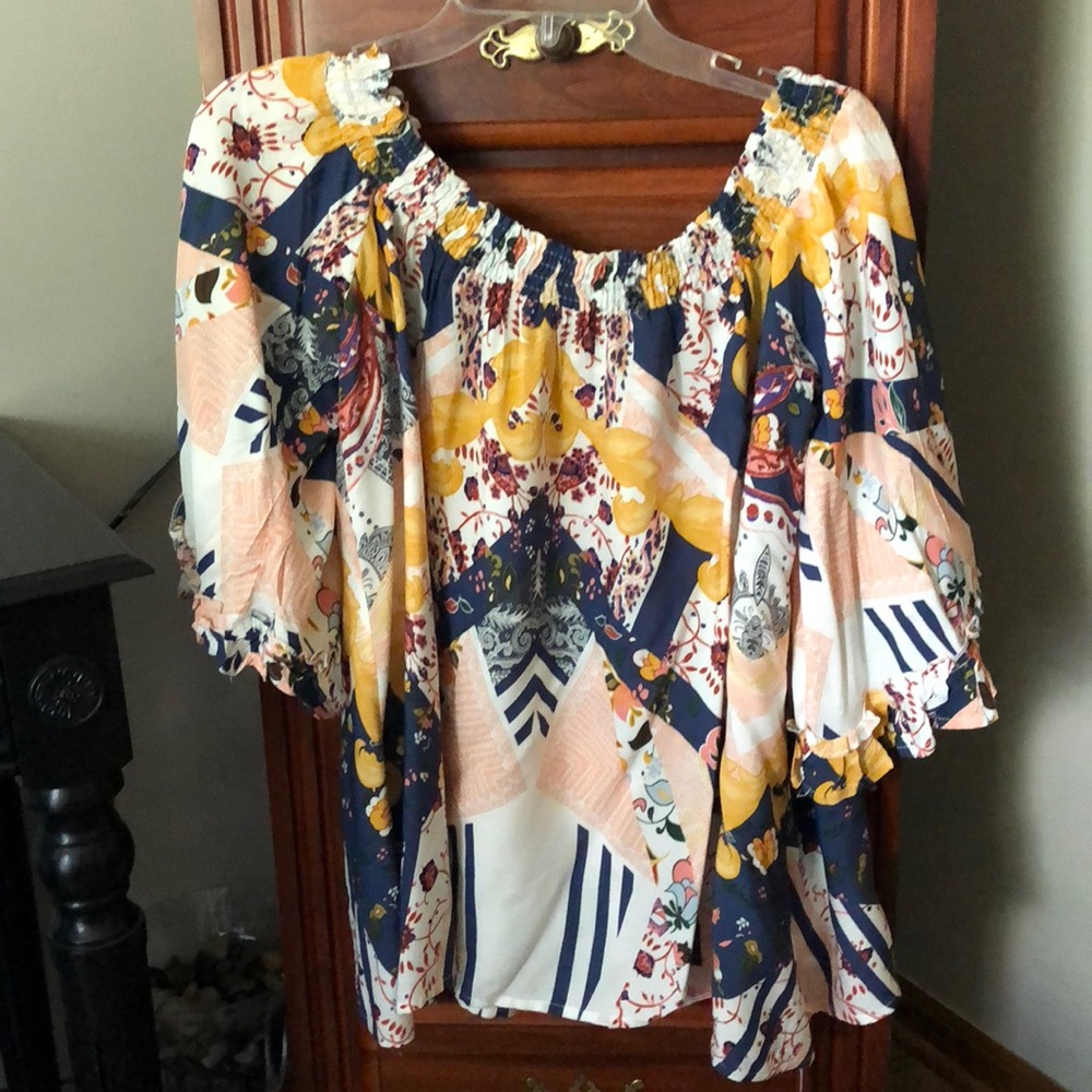 Multi colored off the shoulder peasant top.